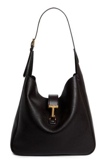 Signature T-shaped hardware adds a heritage touch to this slouchy hobo bag masterfully crafted in Italy from beautifully grained calfskin leather. Hook-tab closure Shoulder strap Leather Made in Italy Designer Handbags Bag For Women Handbags, Slouchy Bag Outfit, Slouchy Shoulder Bag, Timeless Designer Bags, Slouchy Hobo Bag, Vintage Designer Bags, Slouchy Bag, Fall Bags, Hot Bags