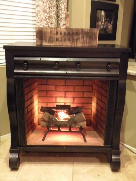 15 Best Faux Fireplaces that You Can Make On Your Own: Ideas and More! Camper Fireplace, Fake Fireplace Ideas, Fake Fireplaces, Fireplace Freestanding, Faux Fireplaces, Dresser Turned, Design Camino, Faux Fireplace Mantels, Fireplace Diy