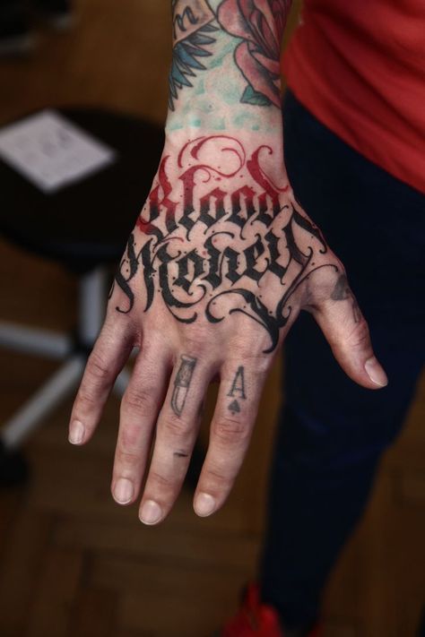 Black Letter Tattoo, Text Tattoo Hand, Lettering Hand Tattoo, Hand Lettering Tattoo, Dark Calligraphy Tattoo, Pawn Tattoo, Tattoo Money, Tattoo Calligraphy, Blood Tattoo