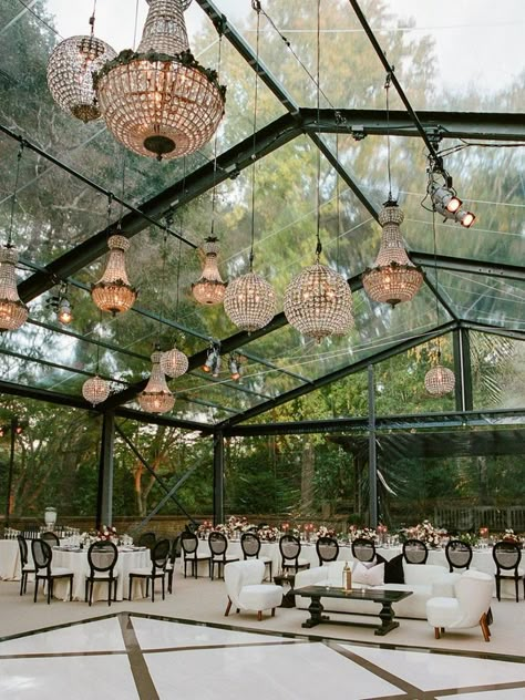 Dreamy hanging chandeliers and black accents tied together to create this tented wedding reception | wedding ideas,wedding inspo,wedding trends,wedding reception,wedding reception decor,wedding reception ideas,wedding table decor,wedding tablescape,wedding table centerpiece,wedding flowers,wedding flower arrangements,romantic wedding,romantic wedding decor,dream wedding,elegant wedding decor,luxury wedding,tented wedding,tented wedding reception,wedding 2023,wedding #wedding #weddingdecoration Chandelier Wedding Decor, Greenhouse Venue, Tented Wedding Reception, Outdoor Tent Wedding, Tent Wedding Reception, Elegant Wedding Decor, Events Place, Wedding Reception Ideas, Garden Wedding Reception