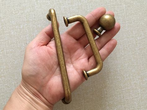 3" 5" 7.5" 12.5" Cabinet Pulls Handle Drawer Pull Kitchen Handles Antique Bronze Dresser Pull Lynns Hardware Retro Solid 76 128 192 320 mm The price is for one piece. Material: zinc alloy Color: Antique Bronze Measurements: A - Round knob: Dia: 1" (25 mm)  When installed the knob sticks out 1.25" (32 mm) B -  Length: 3.5" (90 mm) Hole Spacing (center to center): 3" (76 mm) Protrusion after installation: 1.2" (30 mm) C- Length: 5.6" (142 mm) Hole Spacing (center to center): 5" (128 mm) Protrusion Antique Bronze Kitchen Hardware, Bronze Kitchen Hardware, Bronze Dresser, Bronze Kitchen, Kitchen Drawer Pulls, Dresser Pulls, Kitchen Hardware, Brass Knobs, Cabinet Pulls