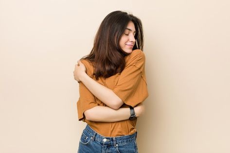 Young brunette woman hugs, smiling care... | Premium Photo #Freepik #photo #business #love #woman #hair Hug Yourself Pose, Hug Pose, Emotionally Focused Therapy, Nature Vs Nurture, Self Esteem Issues, Life Habits, Make Yourself A Priority, Attachment Styles, Secure Attachment