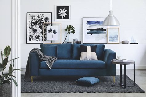 floral art gallery wall in living room with blue sofa from sheridan Living Room Wall Gallery, Perfect Gallery Wall, How To Mix, Gallery Walls, Blue Sofa, Wall Gallery, Bedroom Carpet, Living Room Carpet, Art Gallery Wall