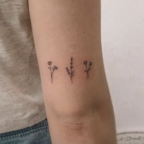 Small Bouquet Tattoo Simple, Tiny Wild Flower Tattoo, Stick Flower Tattoo, Family Drawn Flower Tattoo, Tiny Wildflower Tattoo, 4 Flowers Tattoo, Mini Flowers Tattoo, Horizontal Flower Tattoo, Dainty Flower Bouquet Tattoo