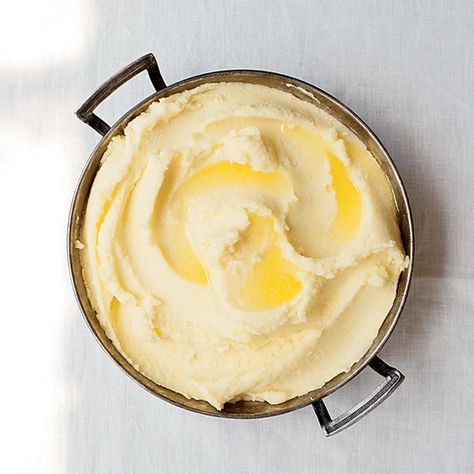 These heavenly, rich mashed potatoes from Anthony Bourdain are made with lots—and lots—of butter. Get the recipe from Food & Wine. Olive Oil Mashed Potatoes, The Best Mashed Potatoes, Mash Potatoes, Best Mashed Potatoes, Joel Robuchon, Best Thanksgiving Recipes, Making Mashed Potatoes, Mashed Potato Recipes, Garlic Mashed