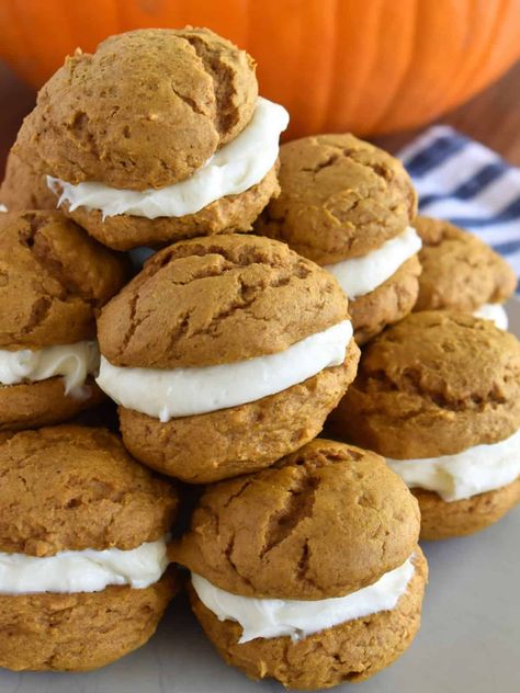 Pumpkin Whoopie Pies with cake mix is a delicious treat to have on hand for the fall season. This simple and tasty dessert is full of pumpkin flavor and the perfect pumpkin recipe for pumpkin lovers! Pumpkin Whoopie Pie Recipe, Cake Mix Recipe, Soft Pumpkin Cookies, Whoopie Pie Recipe, Holiday Baking List, Pumpkin Whoopie Pies, Holiday Desserts Table, Pumpkin Spice Cookies, Pumpkin Recipe