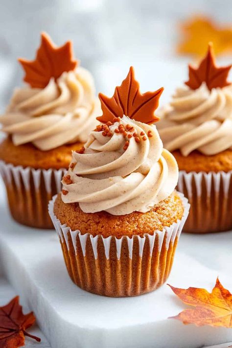 These vegan maple pumpkin cupcakes are moist, flavorful, and topped with a creamy maple frosting. They’re perfect for a Thanksgiving dessert or a sweet snack. Vegan Maple Cupcakes, Maple Pumpkin Cupcakes, Vegan Thanksgiving Desserts, Vegan Pecan Pie Bars, Maple Cupcakes, Vegan Caramel Apple, Pear And Almond Tart, Vegan Cupcake Recipes, Vegan Sweet Potato Pie