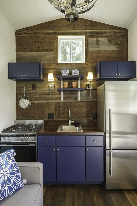 Look at all the storage in this tiny house kitchen! #tinyhouse #trailer #design #kitchen Tiny Kitchen Design, Tiny House Interior Design, Best Tiny House, Tiny House Kitchen, Tiny Cabin, Tiny House Movement, House Design Kitchen, Tiny Spaces, Tiny House Interior