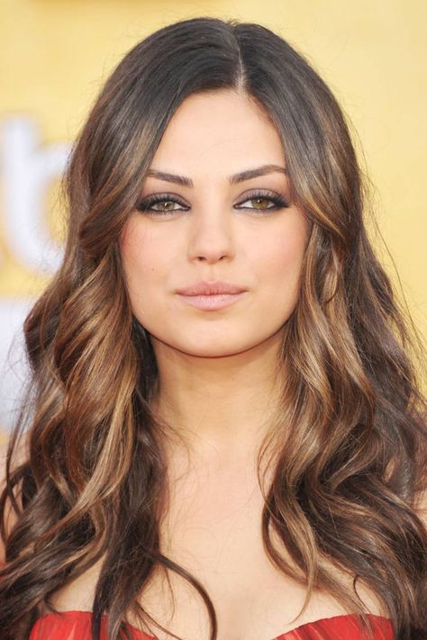 From Caramel to Mocha: The Most Flattering Hair Colors for Olive Skin | Byrdie Mila Kunis Color Analysis, Nice Hair Color, Brown Hair Olive Skin, Hair Color For Olive Skin, Olive Skin Hair, Light Olive Skin Tone, Best Brunette Hair Color, Pale Olive Skin, Light Olive Skin