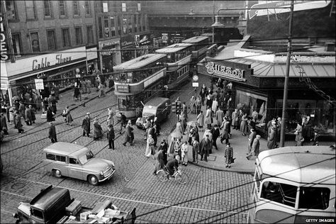 A line of trams emerges from the shelter of Heilanman's Umbrella in Glasgow, where Argyle Street passes under Central Station and dissects Union Street, 1955. Gorbals Glasgow, Glasgow Central Station, Glasgow City Centre, Argyle Street, Scotland History, Glasgow City, Uk City, Aerial Photograph, Glasgow Scotland