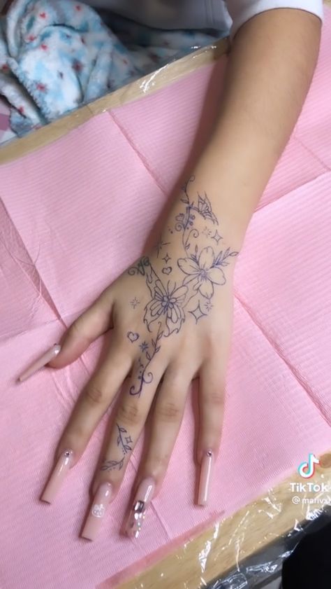 Finger Tattoos For Women Flowers, Dainty Flower Hand Tattoo, Flowers On Hand Tattoo, Pen Arm Tattoo, Pink Hand Tattoo, Hand Flower Tattoos For Women, Hand Tattoos For Women Flowers, Pen Hand Tattoo, Cherry Blossom Hand Tattoo