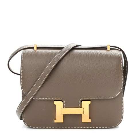 HERMES Epsom Constance 18 Etoupe | Fashionphile Constance Bag Hermes, Hermes Etoupe, Hermes Bag Constance, Hermes Bags Constance, Hermes Constance Bag Outfit, Hermes Shoulder Bag, Constance Hermes, Hermes Crossbody Bag, Hermes Constance Bag