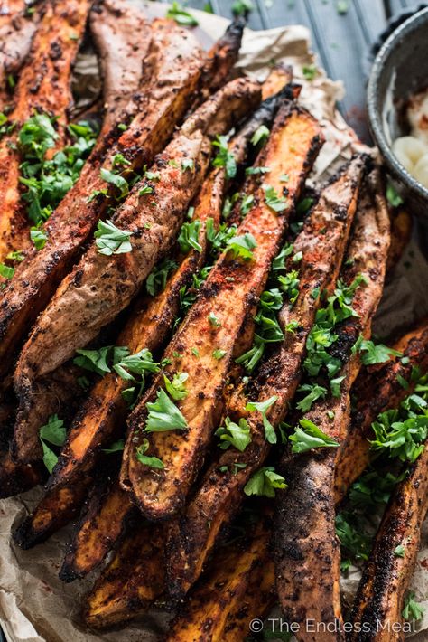 PIN TO SAVE FOR LATER! These easy to make sweet and spicy yam wedges are covered in smoked paprika and chili spices then baked till tender and delicious. They're simple side dish recipe everyone will love. #theendlessmeal #yamwedges #yamfries #sweetpotatowedges #sweetpotatofries #fries #frenchfries #sidedishes #sidedishrecipes #nosugar #sugarfree #fryrecipes Yam Fries, Mango Chili, Yogurt Dipping Sauce, Sweet Potato Nachos, Chili Mango, Easter Side Dishes, Plats Healthy, Chili Spices, Crispy Sweet Potato