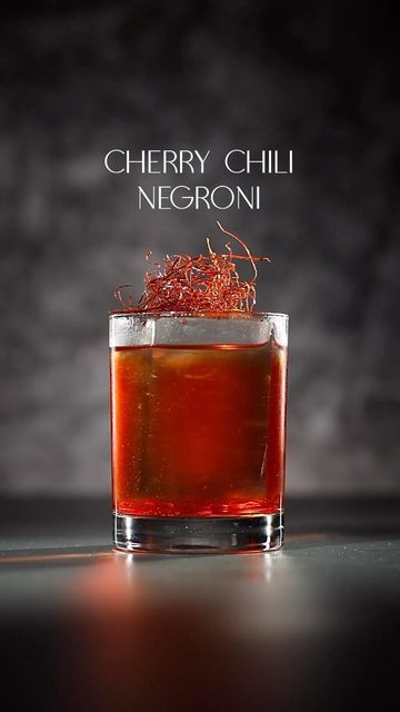 GINTENSIV | Cocktails & Gin on Instagram: "CHERRY CHILI NEGRONI Winter is coming, and this Negroni will spice you up with the heat of chilies. The capsaicinoids in it, the ones responsible for the kick, can get your blood flowing and bring a cozy warmth. Plus, chili’s got Vitamin C, giving your immune system a boost. Recipe: 30ml-1oz CHILI infused GIN 30ml-1oz CAMPARI 30ml-1oz SWEET AGED VERMOUTH 5 dashes CHERRY BITTERS 1 bar spoon CHILI FLAKES mist with MARASCHINO To enhance some umami notes, you can pre-smoke your glass with chili threads. Stir all ingredients with ice in a mixing glass. Strain into ice filled rocks glass. Mist with maraschino. For those who like it spicier, don’t strain out the chili flakes and leave them in the drink. Others can finely strain to avoid chili flake Healthy Cocktail Recipes, Infused Gin, Pretty Alcoholic Drinks, Healthy Cocktails, Liqueurs Recipes, Fancy Cocktails, Sour Cocktail, Bar Spoon, Mixed Drinks Recipes