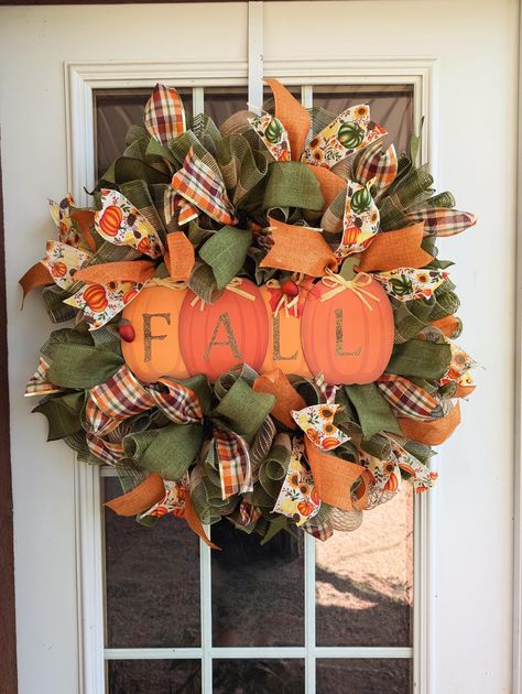 This fall deco mesh wreath perfect for autumn door decorations. This is handmade outdoor wreath, Pumpkin front door wreath. Housewarming Gift. Thanksgiving Wreath will create the atmosphere and warm comfort of your home every day. the diameter 27 inches, deep 8 inches Handmade of deco mesh, ribbons. More door wreathes see here https://www.etsy.com/shop/HappySunflowerHS?ref=seller-platform-mcnav§ion_id=44369236 Ribbon Fluffing: After shipping, you may need to fluff the ribbons to restore their or Thanksgiving Wreath Deco Mesh, Fall Mesh Wreaths With Flowers, Christmas Mesh Wreaths Pumpkin, Happy Fall Yall Deco Mesh Wreath, Happy Fall Yall Wreath, Fall Deco Mesh Wreath, Fall Deco Mesh, Outdoor Wreaths, Moms Crafts