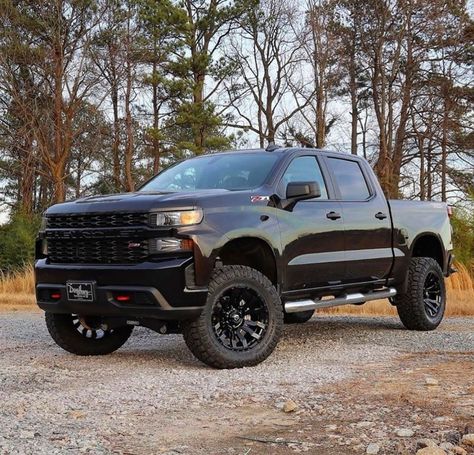 2019 Chevrolet Silverado Trail Boss equipped with a Fabtech 4" Lift Kit Chevy Trail Boss, Black Chevy Silverado, Silverado Trail Boss, New Silverado, Truck Builds, Chevy Trucks Silverado, Silverado Truck, Chevy 1500, Chevy Girl