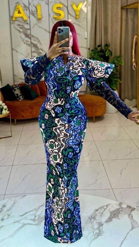 Latest Ankara Gown: Amazing Styles. - Gist94 Three Quarter Ankara Gowns, Ankara Straight Gown Styles For Ladies, Party Wear Long Gowns For Women, Ankara Hausa Dress Styles, Poly Gown Styles, Trending Ankara Gowns 2024, Ankara Long Gown Styles For Wedding, Ankara Straight Gowns Long, Fitted Ankara Gowns