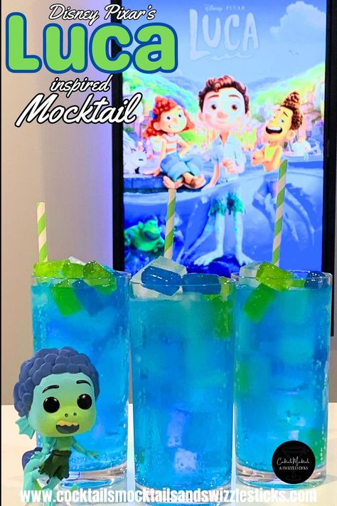 This image shows three tall blue drinks with green and blue jolly ranchers on top with green and white striped straws with a Luca figure from the movie Luca in front of a Luca movie poster Movie Night Dinner Ideas, Disney Dinner Ideas, Dinner And A Movie Ideas, Disney Themed Movie Night, Theme Dinners, Disney Movie Night Food, Disney Cocktails, Disney Themed Food, Disney Movie Night Dinner