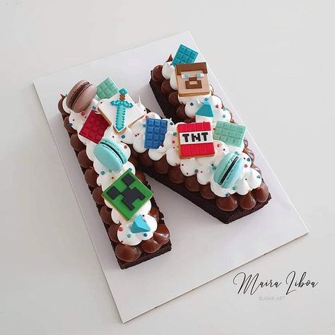 Letter cake by Maira Liboa Number 6 Minecraft Cake, Number 7 Minecraft Cake, Minecraft Cookie Cake, Minecraft Number Cake, Minecraft Party Food, Minecraft Cupcakes, Letter Cakes, Birthday Care Packages, Cake Lettering