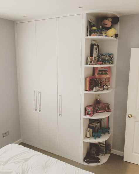 Fitted wardrobe with open shelves. Supplied and fitted by Art Carpentry in Chiswick, London. #fittedwardrobes #fittedwardrobe #fittedfurniture #bespokefurniture #bespokewardrobes #veneer #oakveneer #walnutveneer #builtin #builtinwardrobe #artcarpentry Tall Shelves In Bedroom, Wardrobe With Open Shelves On Side, Wardrobe Open Shelves, Box Room Fitted Wardrobes, Small Inbuilt Wardrobe Ideas, Side Of Wardrobe Ideas, Wardrobe With Bookshelves, Built In Wardrobe Ideas Small Bedroom, Wardrobe With Side Storage