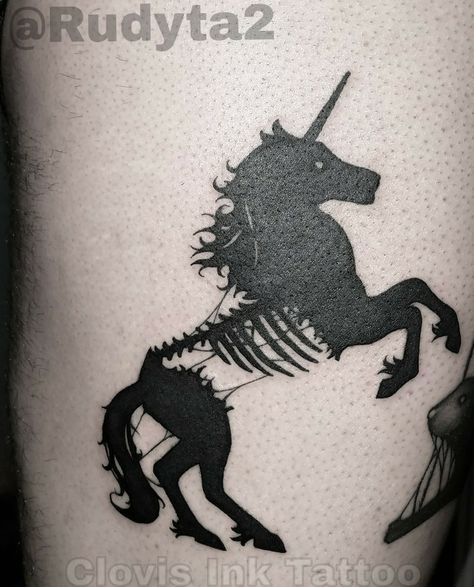 Artist Rudy Acosta showing us another simple but detailed tattoo of a unicorn. An all black tattoo with a torn apart unicorn.  #tattoo #tattooing #tattoos #art #artist #tattooinst #ink #rudy #rudyacosta #clovisinktattoo #clovisink #clovisca #fresno #unicorn #unicorntattoo #femaletattoo #girltattoo #horse #horsetattoo #blackwork #blacktattoo Evil Unicorn Tattoo, Dark Unicorn Tattoo, Unicorn Skull Tattoo, Unicorn In Captivity Tattoo, Gothic Unicorn Tattoo, All Black Tattoos, Unicorn Tattoo, Girl With Green Eyes, Unicorn Tattoos