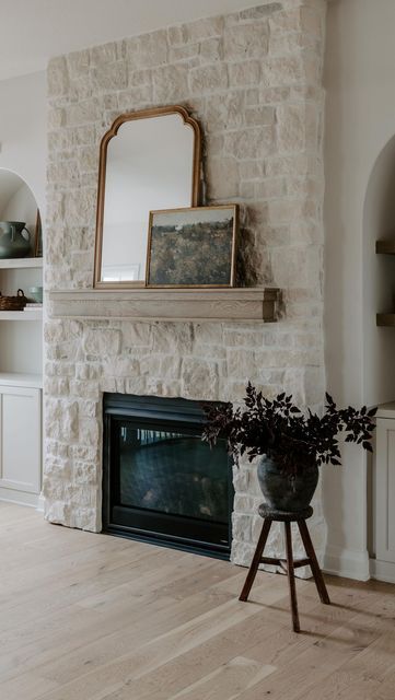 White Cobblestone Fireplace, Cream Color Fireplace, Half Wall Stone Fireplace, Redo Stone Fireplace Ideas, Flat Stone Fireplace, Stone Fireplace No Hearth, Adding Brick To Fireplace, Neutral Stone Fireplace, Faux Limestone Fireplace