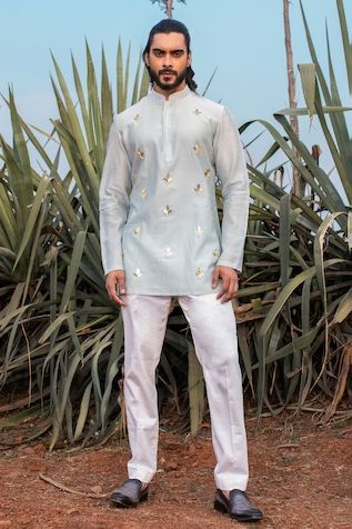 Runit Gupta | Designer Kurta, Nehru Jackets and Sets, Shirts for Men Short Kurta For Men, Lotus Motif, Indian Groom Wear, Men Fashion Photo, Silk Pant, Blue Kurta, Pajama Pattern, Short Kurta, Indian Groom