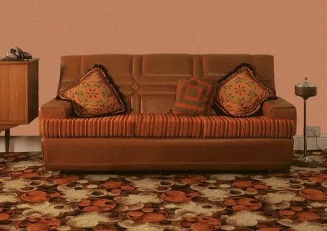 70s orange couch in living room, warm colours, brown cream and orange patterned rug, salmon walls 1970s Couch, 60s Couch, 80s Couch, 70’s Room, 70s Couch, Chair Portrait, Couch In Living Room, Furniture Reference, Men Room Decor