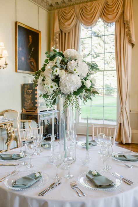 Whispers of Love at Prestwold Hall: Basking in the Splendor of Summer Weddings, Where Timeless Romance Meets Majestic Grandeur. Explore the Captivating Beauty of Prestwold Hall's Stately Elegance, as We Unveil Unforgettable Moments of Sunlit Ceremonies, Lavish Receptions, and Endless Inspiration for Your Perfect Summer Wedding Celebration. Captured by Whiteny Lloyd Sage Green Wedding Table Setting Round, Sage Green Centerpieces Wedding, Sage Green Table Setting, Sage Green Table Decor, Sage Green Wedding Table Setting, Color Palettes 2023, Tall Centrepiece, June Wedding Colors, Wedding Table Deco