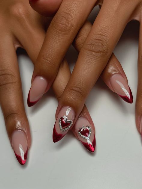 A romantic red French tip manicure on almond-shaped nails, with heart accents and embedded rhinestones. This playful yet stylish design is perfect for date nights and special occasions. French Manicure With Hearts, Tips On Almond Nails, French Tips On Almond Nails, French Chrome Nails, Red French Tips, Tip Manicure, Yellow Chrome, Red French Tip, French Tip Manicure