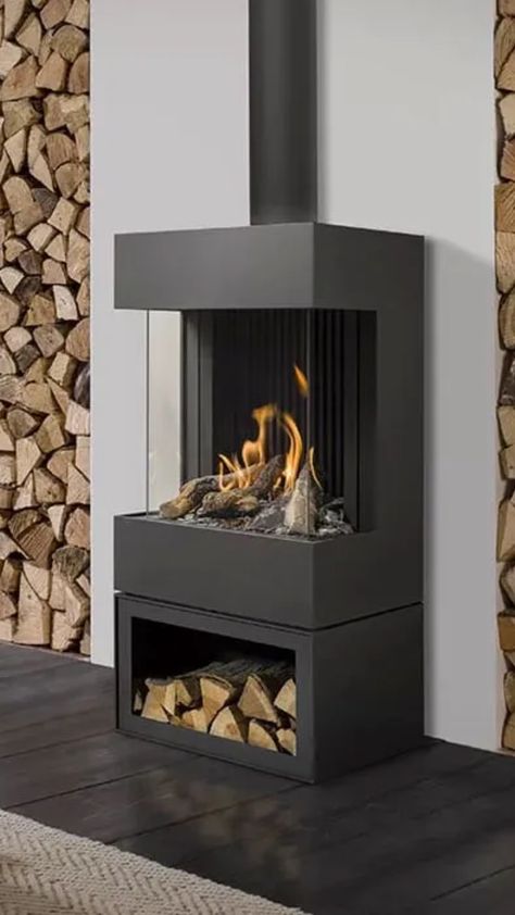 black fireplace unique fireplace gas stove fireplace in a modern home luxury fireplace Modern Fireplace Ideas Living Rooms, Small Wood Stove, Standing Fireplace, Lpg Gas, Freestanding Fireplace, Rocket Stoves, Floating Shelves Diy, Stove Fireplace, Scandinavian Living