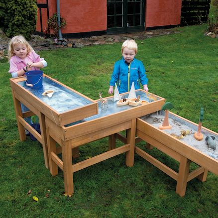 Explore multiple sand and water mixtures on three different levels in this cascading, wooden table set. Water And Sand Table, Water Table Diy, Kids Water Table, Outdoor Play Space, Outdoor Play Spaces, Outdoor Play Areas, Sand And Water Table, Kids Outdoor Play, Natural Playground