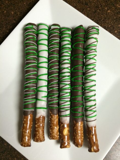 Green And White Pretzel Rods, Green Pretzel Sticks, Dino Pretzel Rods, Green Pretzel Rods, Dinosaur Chocolate Covered Pretzels, Green Chocolate Covered Pretzels, Dinosaur Pretzel Rods, Green Pretzels, Green Food Party