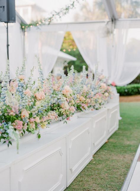 Preppy Garden Wedding, Wedding Tent Decor Ideas, Stage Florals Wedding, Pink Blue And Green Wedding Theme, Stage Flowers Wedding, Wedding Band Stage Flowers, English Cottage Wedding Theme, Romantic Coastal Wedding, Wedding Stage Flowers