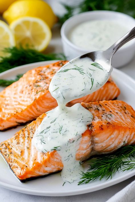 Healthy Baked Salmon with Lemon Dill Sauce Dill Dressing For Salmon, Salmon Lemon Dill Sauce, Baked Salmon With Dill Sauce, Salmon Recipes With Dill, Salmon Dill Sauce, Salmon With Lemon Dill Sauce, Creamy Lemon Dill Sauce, Dill Salmon Recipes, Fried Salmon Recipes