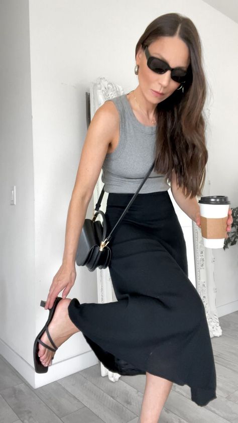 Gray and black outfit 🖤☕️

Neutral style outfit, Gray top, Gray top outfit, Black midi skirt, Minimalist summer outfit, Black summer outfit, gray tank top outfit

#LTKstyletip#LTKFind#LTKworkwear Midi Skirt Outfit Summer Casual, Gray Tank Top Outfit, Black Midi Skirt Outfit Summer, Gray Top Outfit, Racerback Tank Outfit, Grey Tank Top Outfit, Grey Top Outfit, Black Midi Skirt Outfit, Midi Skirt Outfits Summer