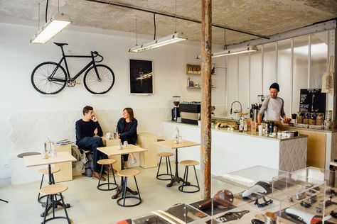 Paris' New Concept Cafés Combine Artisan Coffee with Boutiques Bike Coffee Shop, Cycling Cafe, Workshop Cafe, Bike Cafe, Bike Coffee, Bicycle Cafe, Bike Shops, Small Coffee Shop, Coffee Bike