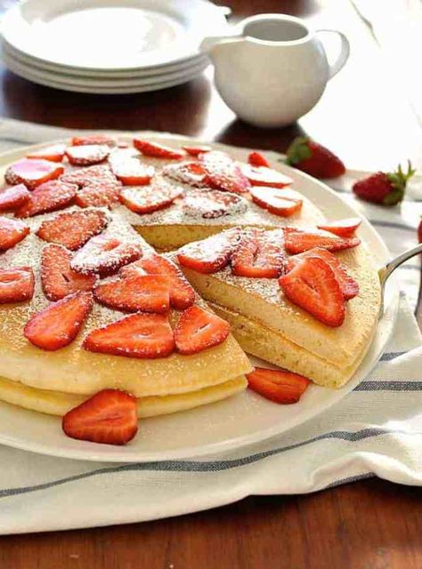 A slice of giant pancake being served Pancakes With Strawberries, Food Staging, Strawberry Pancakes, Pancakes From Scratch, Wakey Wakey, Powder Sugar, Recipetin Eats, Strawberry Slice, Golden Syrup