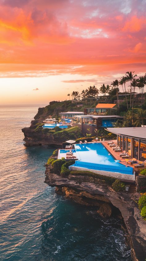 Sunset view of Bali's luxury beach clubs on cliffs, Uluwatu Bali, with infinity pools overlooking the ocean. Savaya Bali, Uluwatu Beach, Best Of Bali, Uluwatu Bali, Infinity Pools, Beach Clubs, Bali Beaches, Exotic Beaches, Jimbaran