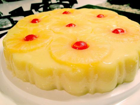 I made this Pina Colada jello mold for Rebecca’s birthday party. It is pineapple Jello with coconut milk and spiced rum, topped with pineapple slices and maraschino cherries. I was a little w… Jello Deserts, Pineapple Jello, Jello Mold Recipes, Congealed Salad, Jello Gelatin, Jello Dessert Recipes, Gelatin Recipes, Maraschino Cherries, Gelatin Dessert