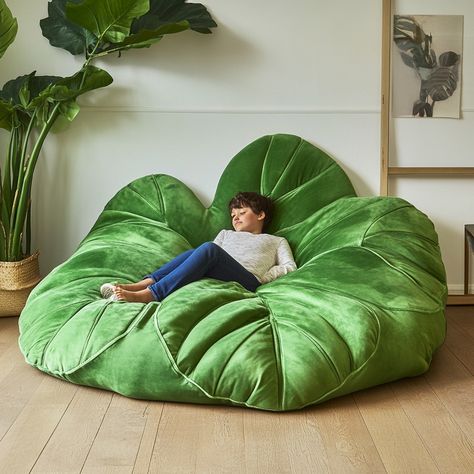 The Monstera Lounger is a bean bag like no other, inspired by the lush, iconic leaves of the Monstera plant. Shaped to resemble the natural curves and perforations of the tropical leaf, this bean bag blends botanical beauty with ultimate relaxation. Its soft, eco-friendly fabric conforms to your body for a cozy, cloud-like feel, while the vibrant green tones bring a touch of nature indoors. Perfect for lounging, reading, or simply unwinding, the *Monstera Lounger* creates a calming, plant-ins... Calm Room, Monstera Plant, Botanical Beauty, Tropical Leaf, Nature Indoors, Eco Friendly Fabric, Green Tones, Natural Curves, Vibrant Green