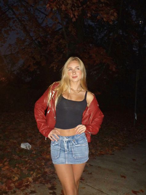 Red leather jacket jean mini skirt fall outfits Denim Skirt With Leather Jacket, Billy Joel Concert Outfit Ideas, Girl In Red Concert Outfit, Red Going Out Outfits, Red Concert Outfit, Red Leather Skirt Outfit, Skirt And Jumper Outfit, Red Mini Skirt Outfit, Mini Skirt Fall Outfit