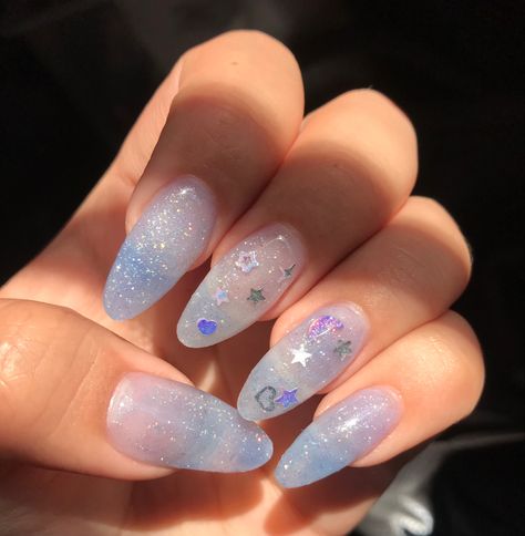 Nail Art On Glitter Base, Clear Blue Glitter Nails, Cute Blue Sparkly Nails, Clear Kawaii Nails, Blue Sheer Nails, Glitter Light Blue Nails, Light Blue Clear Nails, Blue Clear Acrylic Nails, Light Blue Sparkly Acrylic Nails