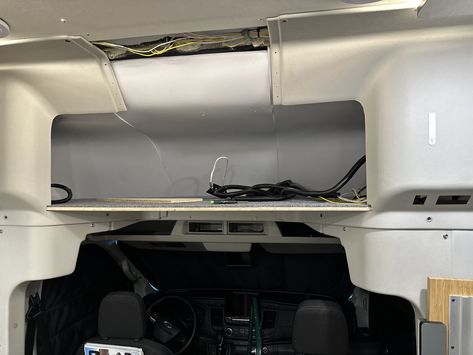 James built this massive shelf above the cab area of our Ford-Transit based RV! See how he did it here... Class C Rv Over Cab Storage Ideas, Winnebago Ekko, Grey Stuff, Class C Rv, Pipe Insulation, Rv Tips, Overhead Storage, Cab Over, Led Clock