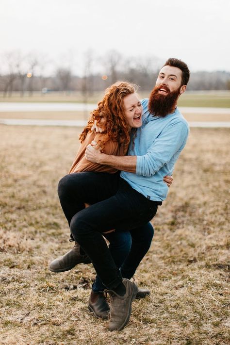 girl holding guy in funny engagement pictures Funny Fall Engagement Photos, Funny Engagement Photos Ideas, Fun Engagement Photos Creative Hilarious, Silly Engagement Photos Fun Poses, Funny Engagement Photos Humor, Engagement Anouncment, Engagement Photos Silly, Engagement Photos Funny Goofy, Fun Engagement Photos Funny