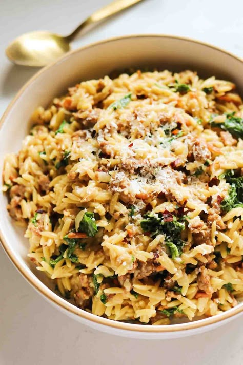 This easy one pot zuppa toscana orzo recipe is inspired by my favorite soups from Olive Garden. It's a perfect fall dinner! Olive Garden Soup, Garden Soup, Orzo Dishes, Mackenzie Smith, Orzo Recipe, Orzo Recipes, One Pot Pasta Recipes, Pasta Dinners, Spicy Sausage