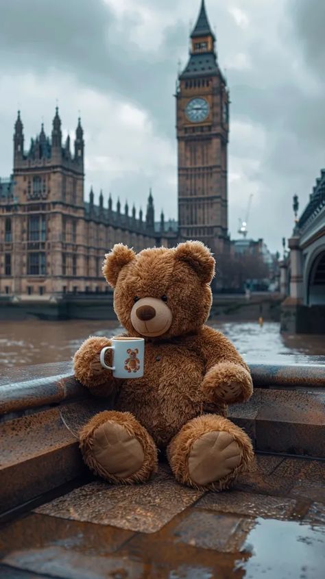 A teddy bear is sitting on a ledge with a cup in its paw. The background is the Palace of Westminster and the Elizabeth Tower, also known as Big Ben, in London, England ->> more details in ai-img-gen.com Teddy Bear Wallpaper Iphone, Teddy Bear Background, Bear Wallpaper Aesthetic, Huge Teddy Bear, Sitting On A Ledge, Teddy Bear Sitting, Huge Teddy Bears, Cute Teddy Bear Pics, Elizabeth Tower