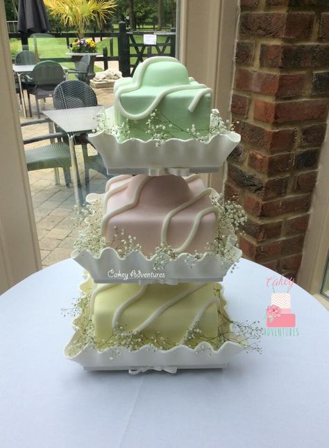 Giant french fancy wedding cake with edible cases! French Fancy Cake, Laduree Wedding Cake, Giant Wedding Cakes Elegant, French Fancy Wedding Cake, Frilly Wedding Cake, Ceremony Flowers Aisle, French Wedding Cakes, Afternoon Tea Wedding, Fancy Wedding Cakes