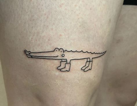 Funny Alligator Tattoo, Croc Tattoo Ideas, Tiny Crocodile Tattoo, Crocodile Tattoo Cute, Cartoon Crocodile Tattoo, Cute Gator Tattoo, Crocodile Tears Tattoo, Alligator Tattoo Cute, Tiny Tattoos Funny