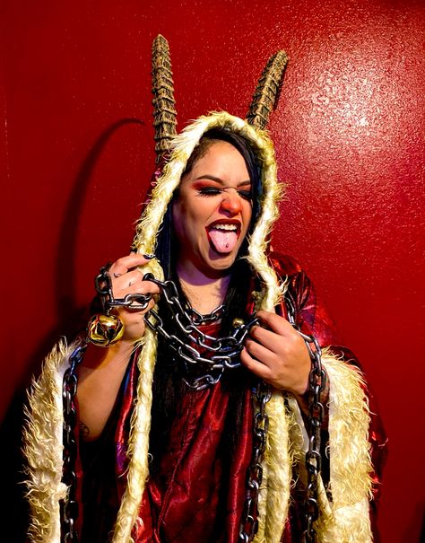 Used Spirit Halloween Krampus animatronic robe, horns and chains for this  photo shoot. Krampus Costume Women, Krampus Costume Female, Krampus Halloween Costume, Krampus Outfit, Krampus Makeup, Krampus Photoshoot, Female Krampus, Krampus Makeup Inspiration, Krampus Cosplay